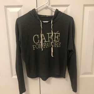 Casual cropped grey top.